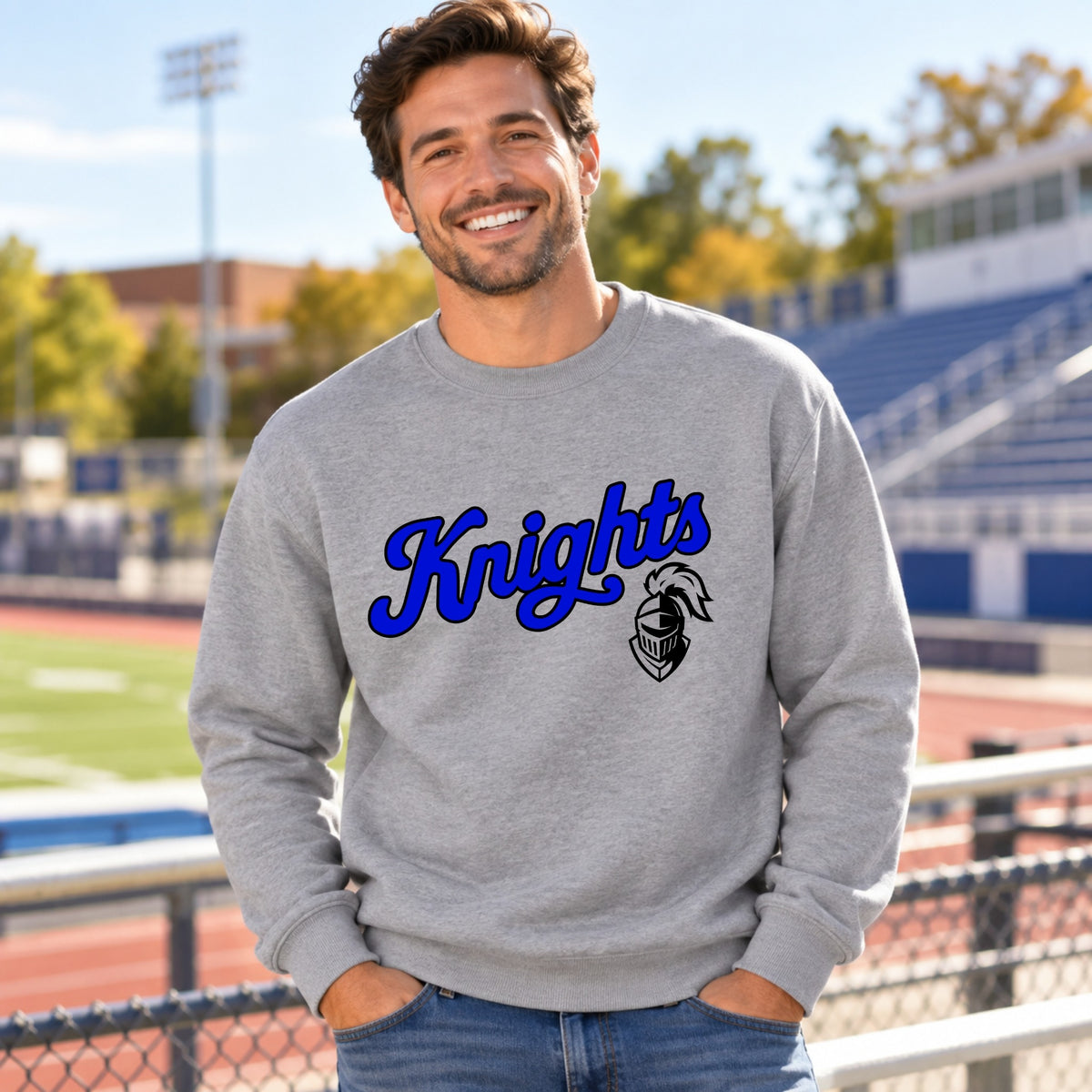 Adult model wearing Knights script grey crewneck